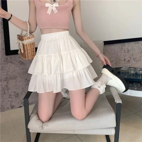 Mini saia de babados brancos para mulheres, cintura elástica, linha A, solta, estilo preppy, fofa, curta, plissada, moda coreana, kawaii - Imagem 3
