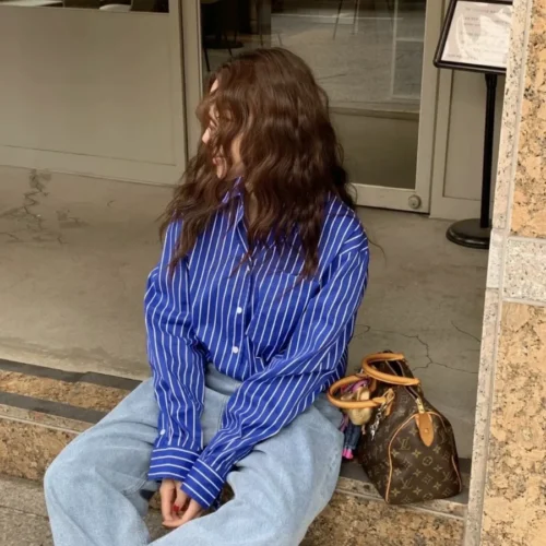 ETJ 2025 Primavera novo design de moda feminina simples versão solta de camisa de popeline de manga comprida tudo-em-um casual e confortável