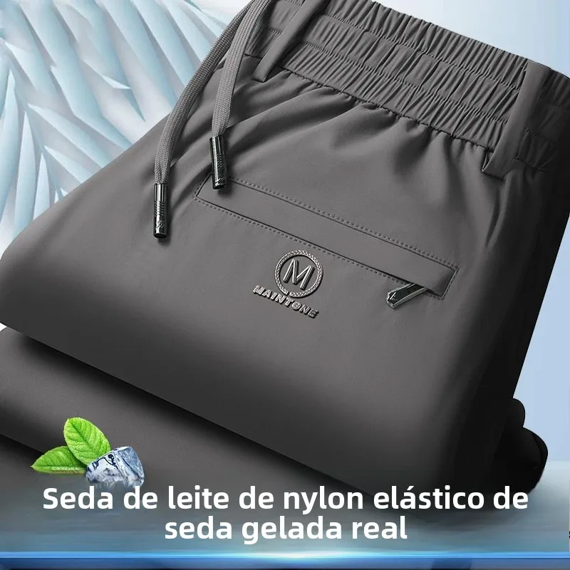 Calças casuais finas de verão masculinas de seda gelada, soltas, respiráveis, de secagem rápida, elásticas, com ajuste reto, calças esportivas da moda